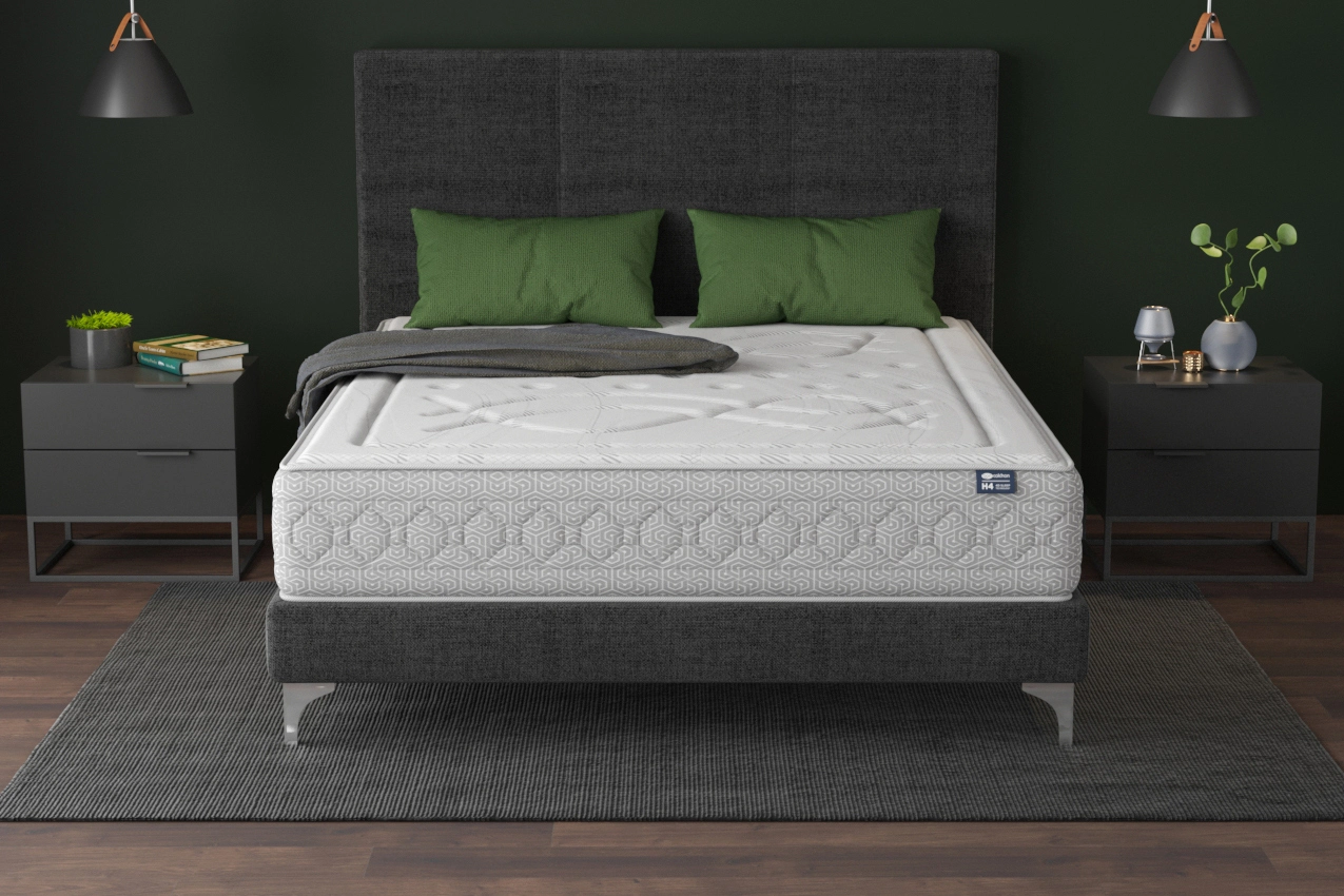 Colchón de espuma H4 en una cama